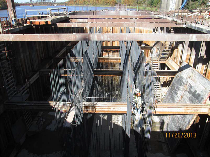 Tying rebar steel for the vertical shaft at Pier 15, in the cofferdam