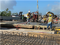 Crews complete a deck pour on the Maple Fork Bridge for the I-10 widening and improvements project in Sulphur.