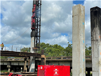 Crews drive piles for the Sabine Relief Bridge replacement.